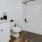 a bathroom with a toilet and sink
