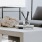 a table with a glass coffee table and a glass coffee table with a white coffee table and a